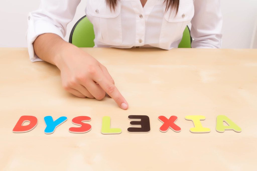 The word dyslexia spelled out with a backward "E."