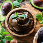 Chocolate Avocado Pudding with mint leaf.